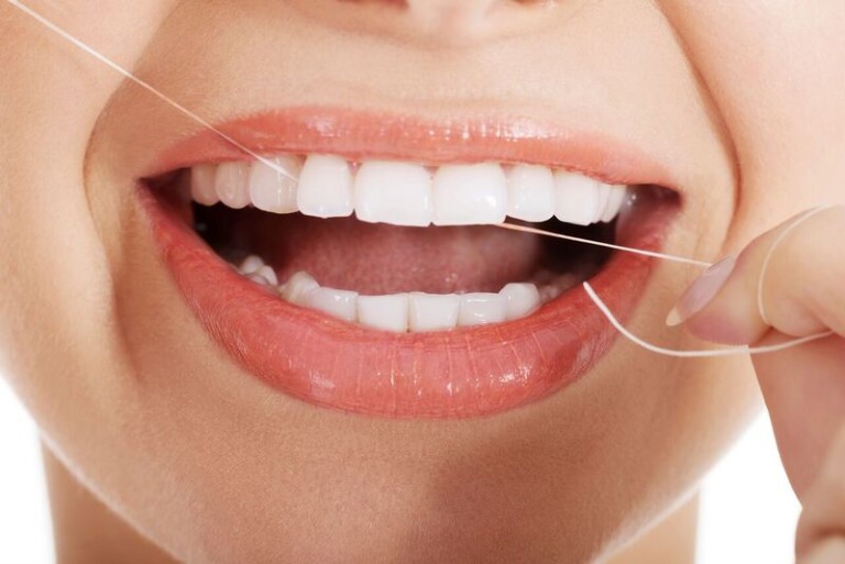 Flossing Guide Dentist in Hollywood FL Karen Gordon DMD